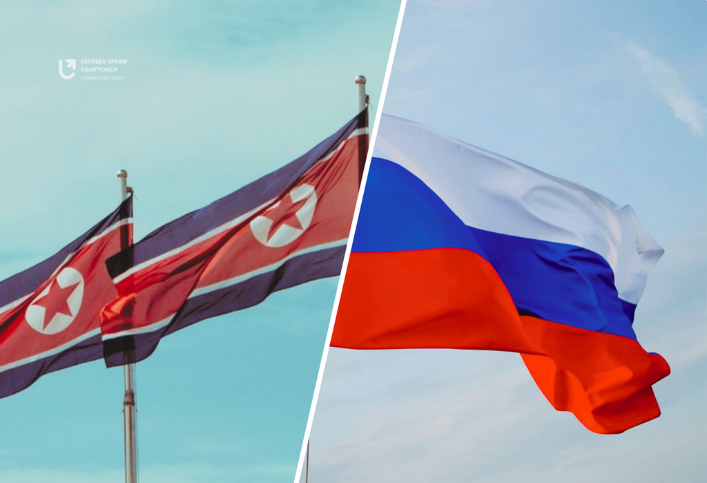 Po lewej stronie dwie flagi Korei Północnej, a po prawej stronie flaga Rosji