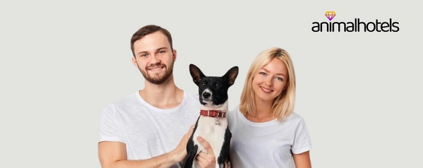 baner Animalhotels - dziewczyna i chłopak z psem